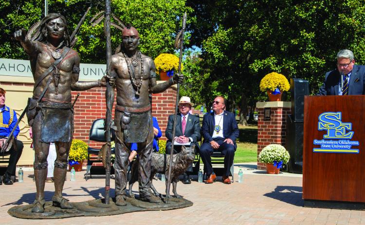 Southeastern Oklahoma State University President Thomas Newsom speaks during the dedication of “The Two Brothers” sculpture that was created to symbolize the ever-present synergy between the university and sovereign tribal nations as they work for the greater success of the region. The sculpture is located at SE Legacy Plaza. Matt Swearengin | Durant Democrat