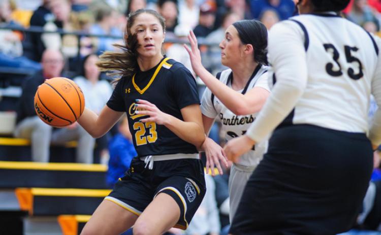 Caddo Lady Bruin Jaycie Nichols is shown with a Latta Lady Panther during the Bertha Teague Mid America Classic. Richard R. Barron | The Ada News