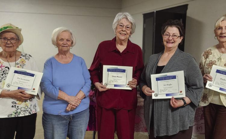 Pat Accountius, Elaine James, Diane Harper, Ivy Hughs and Phyllis Bond were recognized for their years of OHCE membership during the OHCE Tea Party. Photos provided