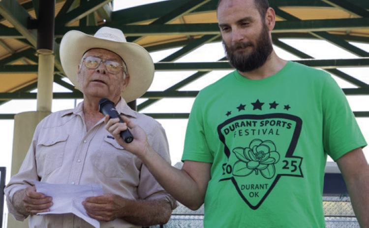 Rick Mote speaks after a ribbon cutting for the baseball diamonds at the Durant Multi-Sports Complex that were named in his honor. On the right is Ryan Brewer, Durant Parks &amp; Recreation manager. Matt Swearengin | Durant Democrat