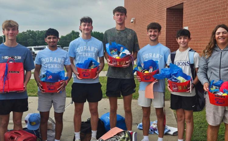 Durant Lions boys tennis players pose before heading to a state tournament. Photo provided