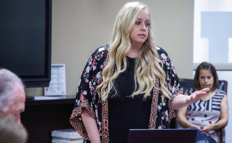 Melanie Knight speaks during a meeting last week of the Durant Board of Education. Knight asked the board to change policy to require a monitor on busses that transport special-needs students. Matt Swearengin | Durant Democrat
