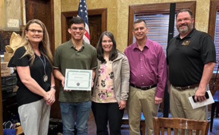 Durant High School senior Mitchell Palmer was named the Kiwanis Student of the Month. From left, Kiwanis President Shyla Whitlock, Mitchell Palmer, Monica Palmer, Calvin Palmer and Kiwanian Jason Manous.