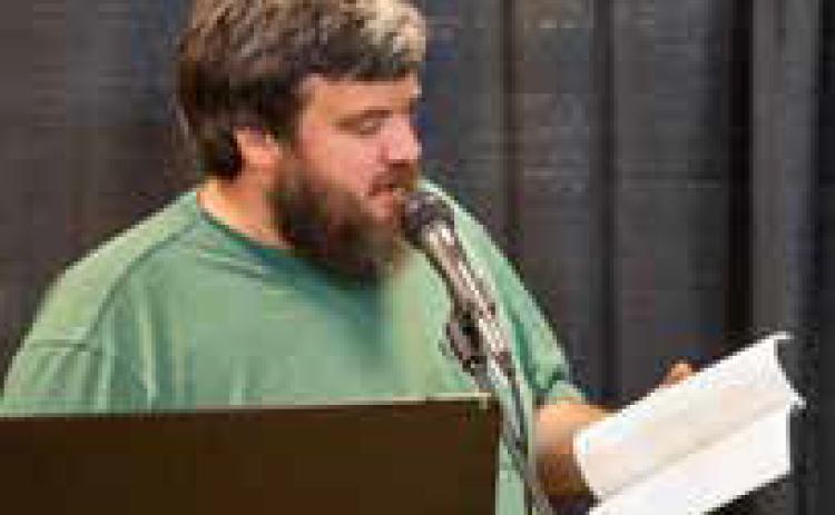 Cullen Whisenhunt reads at Poetry on Lost Street.