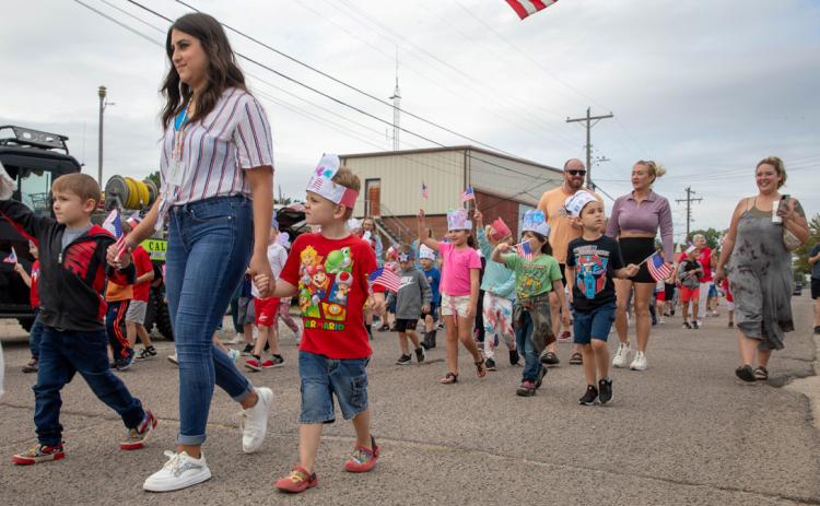 Children from Calera School paraded in front of the fire station on Sept. 11 to honor first responders.