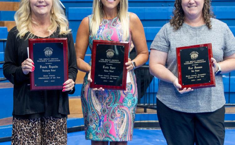 Matt Swearengin | Durant Democrat The Bryan County Teachers Meeting was Aug. 29 at the Southeastern Bloomer Sullivan Arena the 2025 teachers and administrator of the year were named. From left, Pam Reynolds, Bennington Superintendent, administrator of the year; Karla Speer, Calera, elementary teacher of the year, and Kaci Parsons, Silo, secondary teacher of the year.