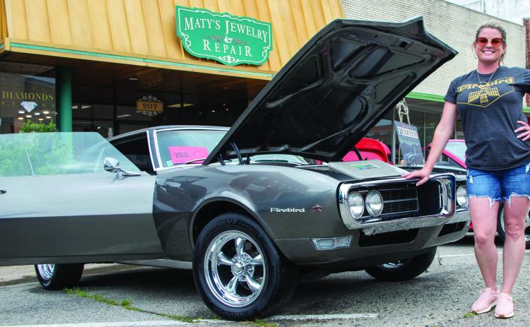 Monica McLaren won Best in Class for her 1968 Pontiac Firebird at the Durant Lions Club Draggin’ Main Car &amp; Bike Show on Saturday in downtown Durant. The car has been in McLaren’s famiily since 1968 when her grandmother bought it for McLaren’s mother as a college graduation gift. It was driven many miles and languished for 16 years until being restored in 2025. Matt Swearengin | Durant Democrat