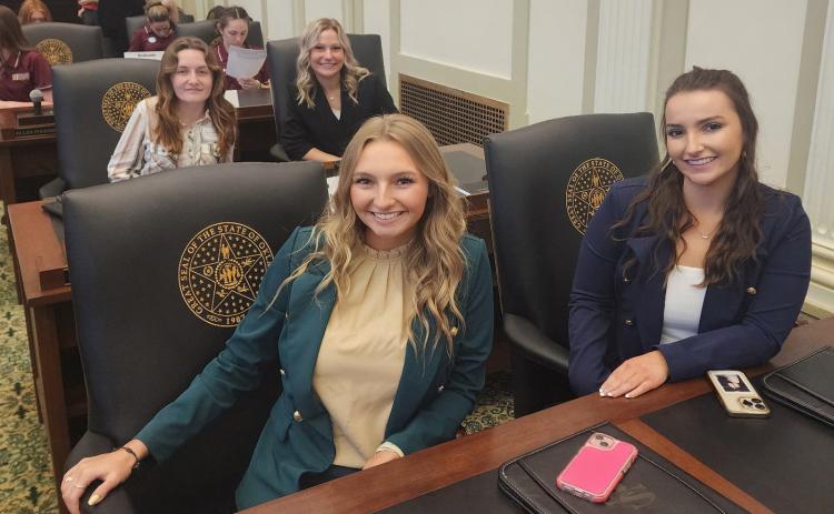 On the floor of the State Capitol are Southeastern students, front row Kaysun Thralls, left, and Jill Scott. Back row are, Cora McKinney, left, and Jacee Bentley. Josh Manck | SE
