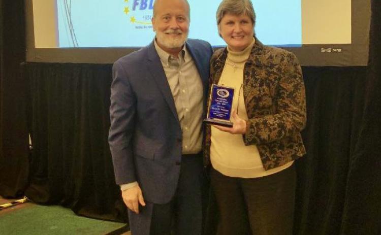 Dr. David Whitlock receives SWCRA Best Educator Award from FBD Executive Director Michelle McEacharn. Photos provided