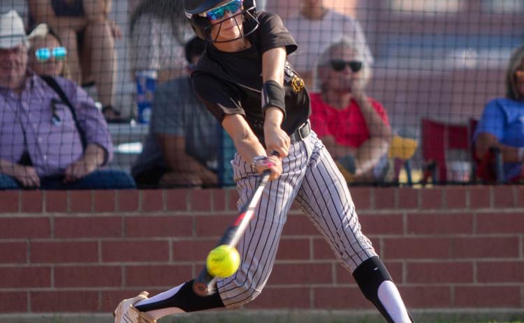 Caddo Lady Bruin Kayden Cowan hits the ball. Matt Swearengin | Durant Democrat