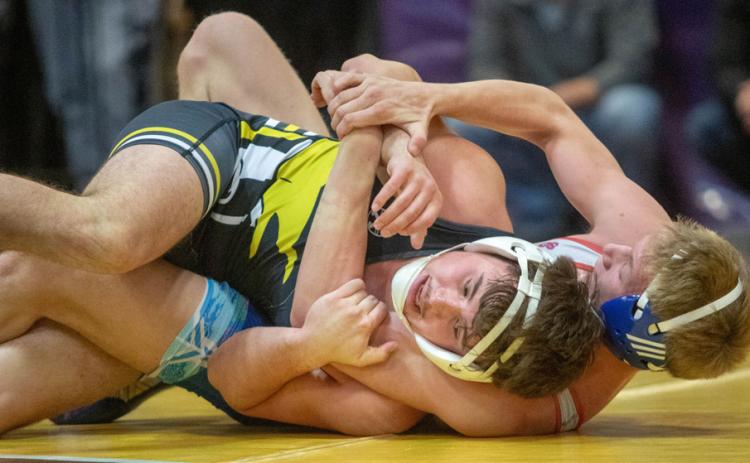 Caddo Bruin Noah Dry wrestles during the tournament at the Choctaw Event Center.
