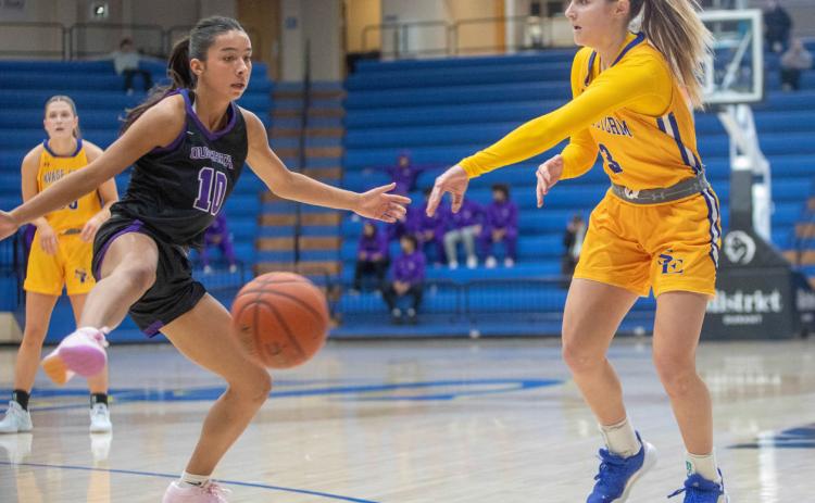 Southeastern Women’s basketball player Stevie Stinchcomb is shown in a recent game with Ouachita Baptist. Monday, SE defeated Northwestern. Matt Swearengin | Durant Democrat
