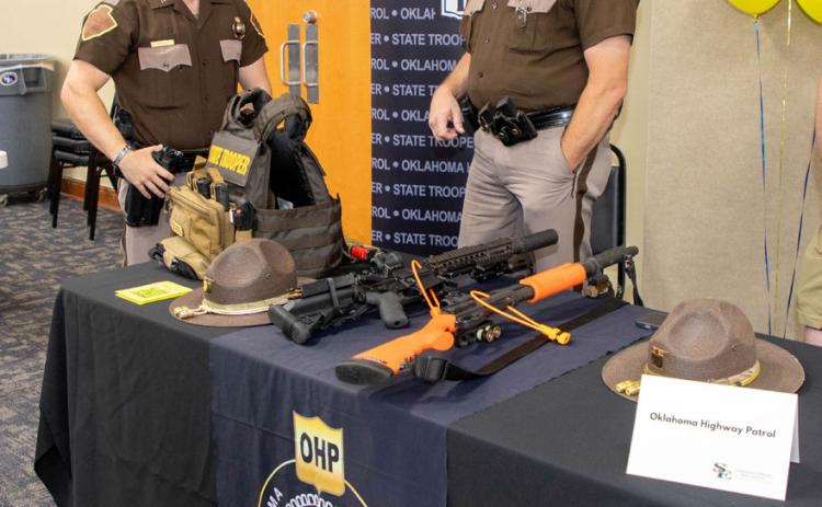 The Oklahoma Highway Patrol had a table at the Southeastern Career Services All Majors Career Fair Sept. 17 in the Hallie McKinney Ballroom. Shown are, Jerrid Hobbie, left, and James Reinecker.