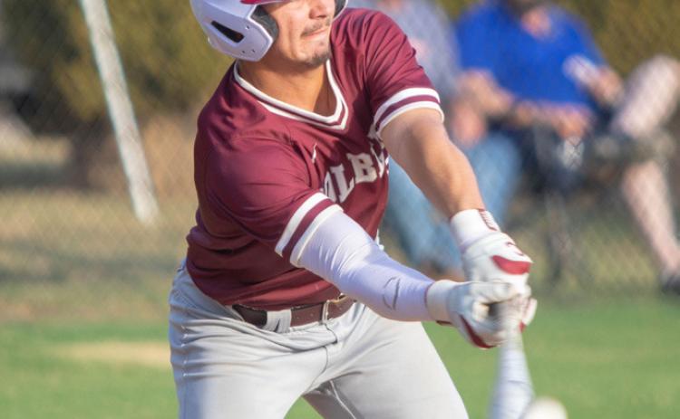 Colbert Leopard Isaiah Lopez hits the ball. Matt Swearengin | Durant Democrat