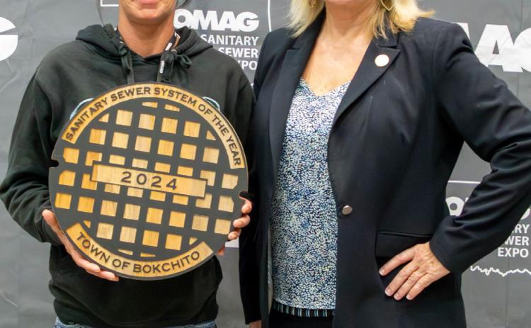 The Town of Bokchito received the OMAG Sanitary Sewer System of the Year award and shown are Misty Smith, left, public utilities authority director, and Leslie Osborn, Commissioner for Oklahoma Department of Labor. Photo provided