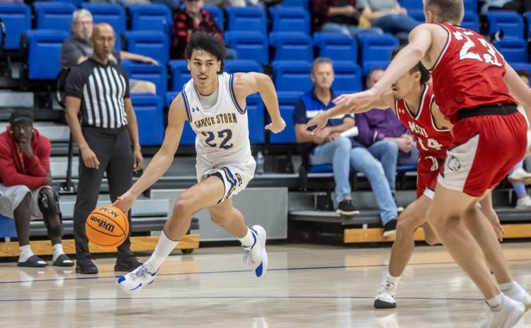 Savage Storm player Saxon McWilliam dribbles down court. Dan Hoke | SE