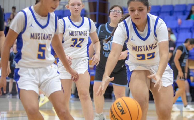 Rock Creek Lady Mustangs from left are, Lilly Torres, Kyllee Freeman and Ana Ojeda. The Lady Mustangs defeated the Achille Lady Eagles in a home game last week. Matt Swearengin | Durant Democrat