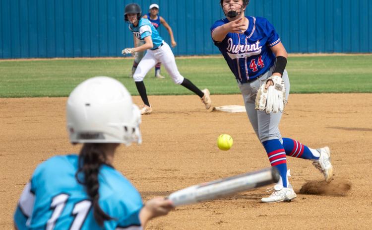 Durant Lady Lion Emma Sherrer fires a pitch at an Allen Lady Mustang batter during a recent scrimmage. Matt Swearengin | Durant Democrat