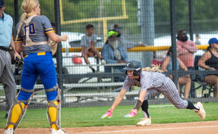 Caddo Lady Bruin Braylee Malone runs toward home plate in the game with Rock Creek. Matt Swearengin | Durant Democrat