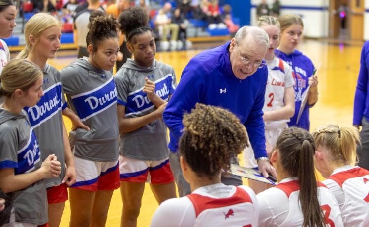 Durant Lady Lions head coach Tony Robinson talks to players during the recent home game with McAlester. Matt Swearengin | Durant Democrat