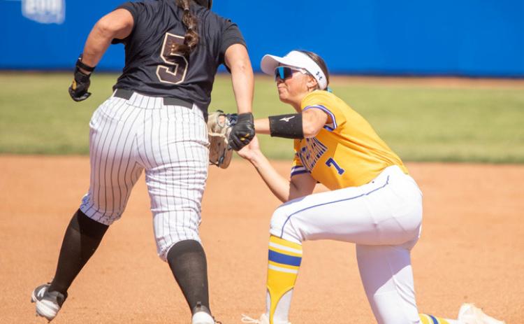 SE’s Abrianna Kennedy tags a Harding player. Matt Swearengin | Durant Democrat
