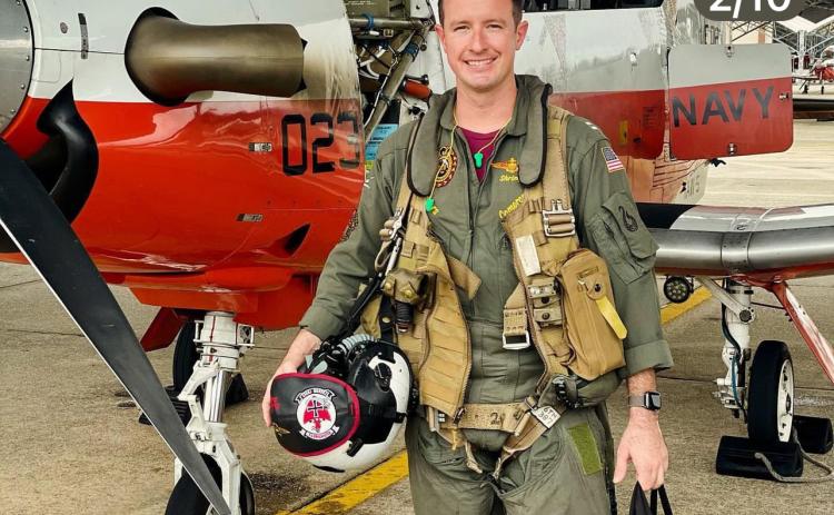 Lt. Cameron Baxter in front of his training plane, the T-6B Texan II. In 2.5 years, he racked up more than 1,000 flight hours training other pilots. Photos provided