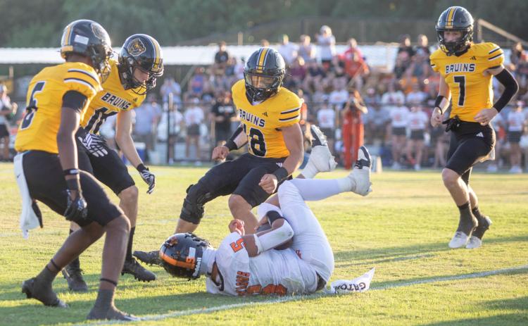 Bayler Black and RG Workman are among Caddo Bruins shown in a recent home game. Matt Swearengin | Durant Democrat