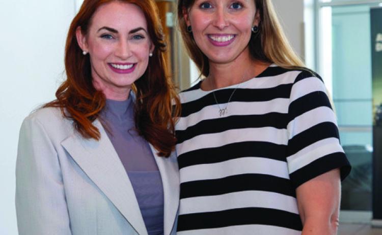 Matt Swearengin | Durant Democrat Durant Area Chamber of Commerce CEO Kara Byrd, left, is shown with Maddison Williams, director of the West Durant Merchants Association. Byrd was honored during a reception at Stuteville Chevrolet.