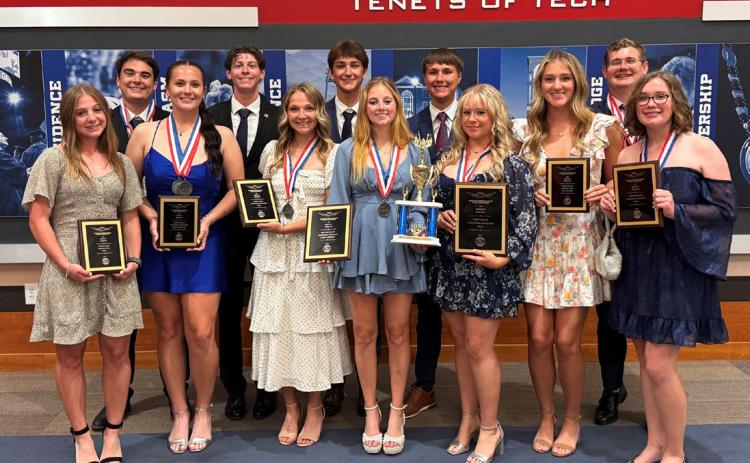 The members of the Southeastern Flight Team pose with trophies from the 2025 Region IV SAFECON event at Louisiana Tech University in Ruston, La. Photo provided