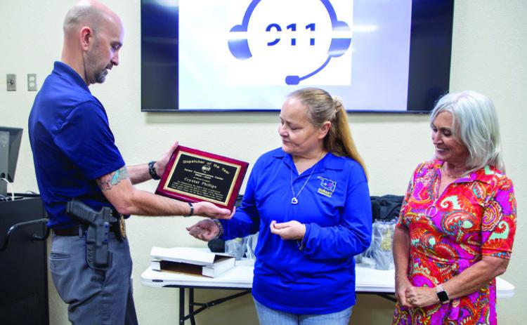 Durant/Bryan County 911 center dispatcher Crystal Phillips was named Dispatcher of the Year and presenting her with the award is Durant Police Lieutenant and 911 Supervisor Chris Marcy. Also shown is City Manager Pam Polk. Matt Swearengin | Durant Democrat