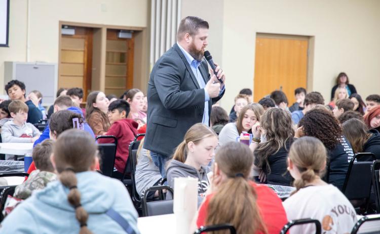 Dillon Bowen, community loan officer for Durant First United Bank, speaks to students during the Eighth Grade Discovery Day. Matt Swearengin | Durant Democrat