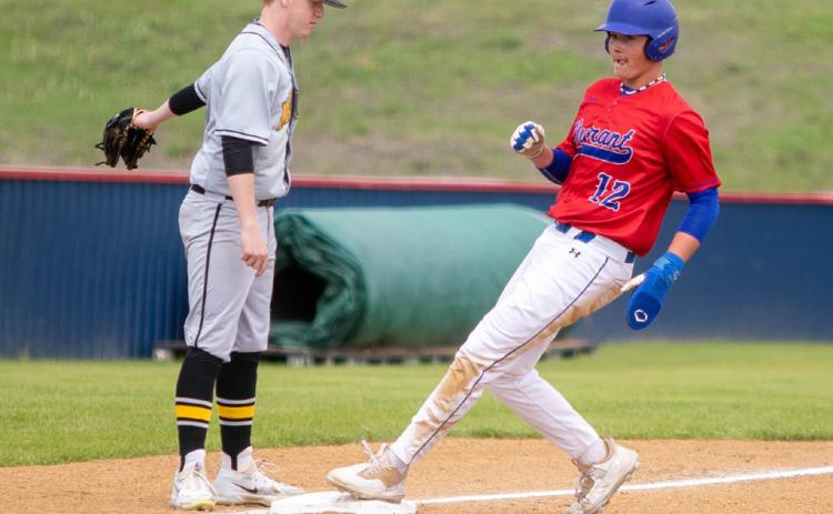 Lion Kaden Neill runs to third base. Matt Swearengin | Durant Democrat