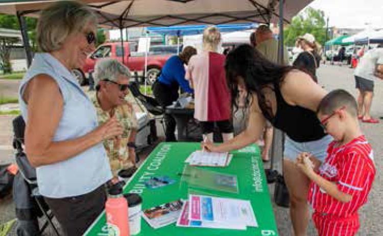 Mark Mesiti-Miller and Donna Murphy of Durant Sustainability Coalition had a table at a recent Magnolia Farmers Market. DSC is a non-profit, community organization committed to educating and energizing citizens in sustaining the region’s environmental richness, natural resources and beauty. Matt Swearengin | Durant Democrat