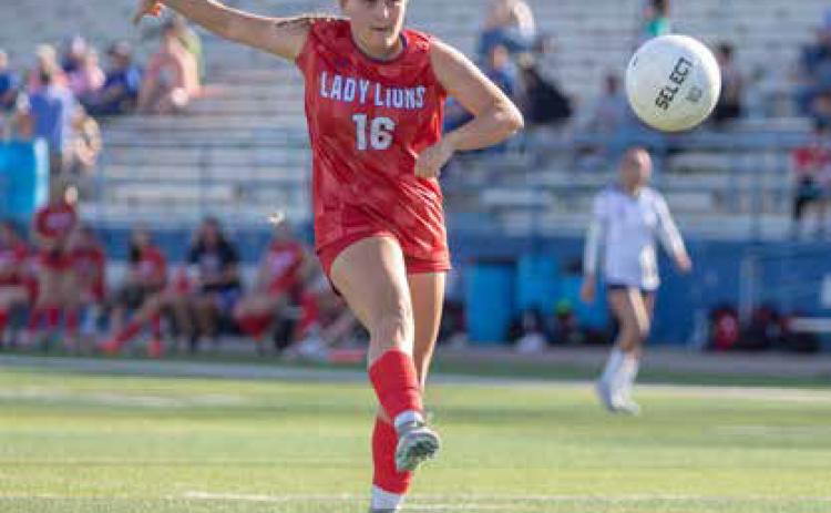 Lady Lion Kira Hoffman made a goal with this kick during the game last Friday with Tulsa Hale at Paul Laird Field. Matt Swearengin | Durant Democrat