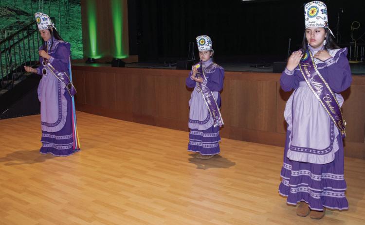 The 2025-2026 Choctaw Nation Royalty performs The Lord’s Prayer during opening ceremony of the Choctaw-Irish Friendship Festival at the Choctaw Cultural Center. From left, Senior Miss Candis Battice (District 12), Little Miss Leigha Scott (District 11), and Junior Miss Akeiley Willis (District 7). Matt Swearengin | Durant Democrat