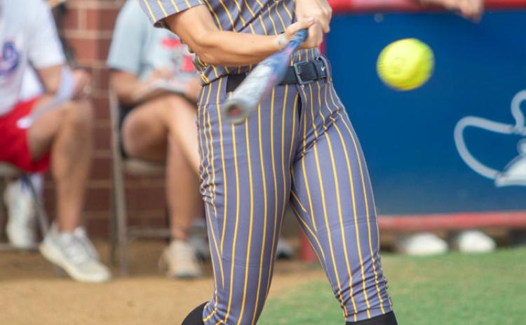 Lady Bulldog Tori Allmon hits the ball. Matt Swearengin | Durant Democrat