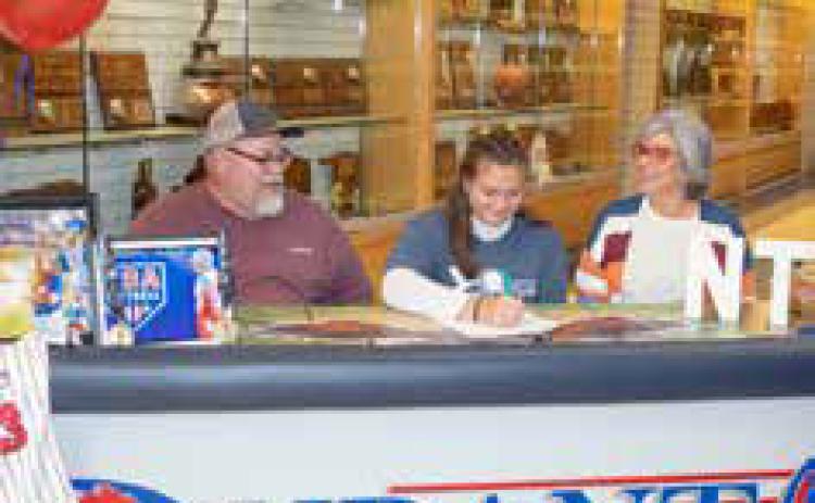 Lady Lion softball standout inks scholarship