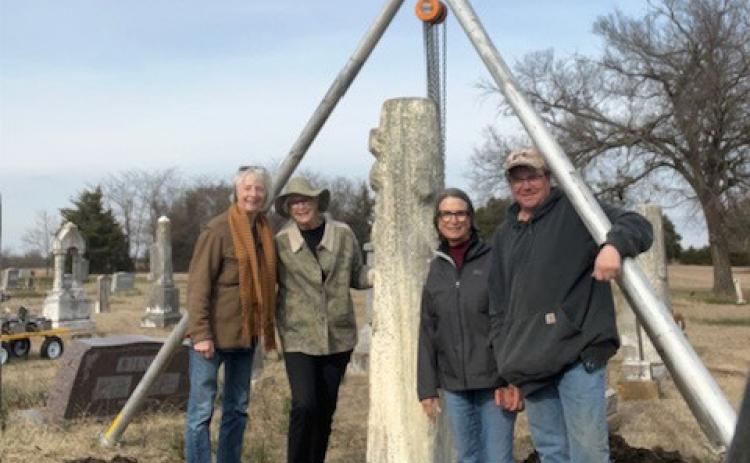 Headstones were restored recently at Gethsemane Cemetery in Caddo. From left, Vesta Baker, Celia Reid, Olivia Carson and Russ Gardner, who owns Restoration Services and performed the the work. The others shown are members of Caddo Civic and Cemetery Club and Restoration Committee. Photo provided