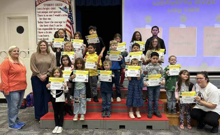 Washington Irving Terrific Kids for the month of November are: (pictured left to right, back row) Jade Williams, June Carter, Nashoba Cunningham, Rayven Williams, Aiselynne Johnson and Basilio Flores Bernal. (Third row) Hazel Davis, Mateo Oliva Lopez, Wyatt Shastid, Sebastian Gomez and Brinlee Carter. (Second row) Lauralynn Hull, Sable Glover, Bennett Belcher, Alayna Babb, Madden Nunley and Joe Nix. (Front row) Isrealia Morris and Tesla Smith. Also pictured are Kiwanis representatives, Angela Pierce and Tra