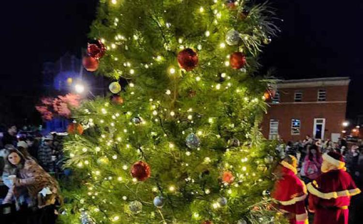 The City of Durant Christmas tree lighting ceremony was Dec. 4 at city hall. Hot cocoa and cookies were served by Durant Church of Christ. Santa was available for photos courtesy of Durant Main Street and music was provided by DJ Flashpoint.