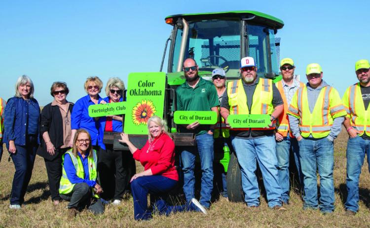 The Fortnightly Club received a grant to plant wildflower seeds alongside Highway 69/75 at the Washington Avenue exit. Shown in no particular order are, Monica Bartley, Color Oklahoma; Ty House, Hoss Williams, Matthew Powell and Jeremy Williams, ODOT; Aaron Saldivar, Phillip Hightower and Ryan Brewer, City of Durant; Charlene Ridgway, GFWC-Ok president, and Fortnightly members Sharon Robinson, Betty Clay, Paula Sullivan and Mary Frank. Matt Swearengin | Durant Democrat