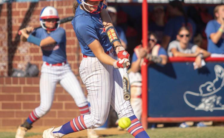 Lady Rebel Neely House swings at the ball in the game with Kingston. Matt Swearengin | Durant Democrat