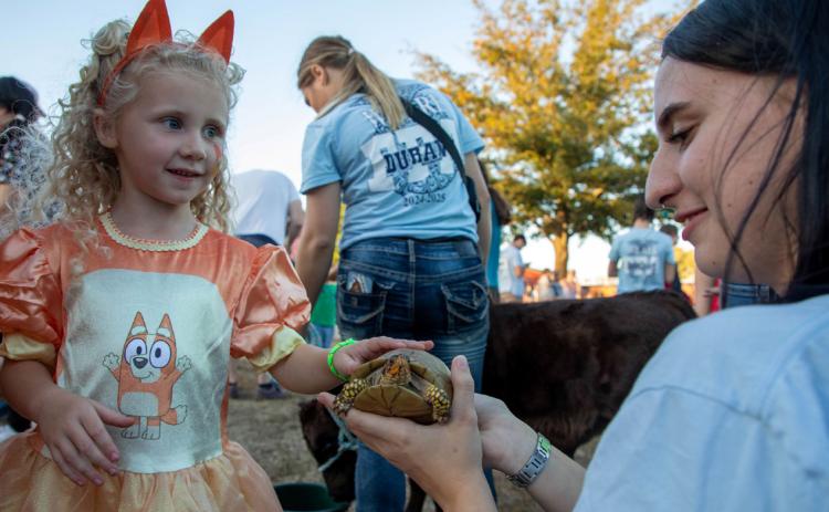 Durant FFA had a petting zoo at Northwest Heights Elementary School Fall Family Fun Night.