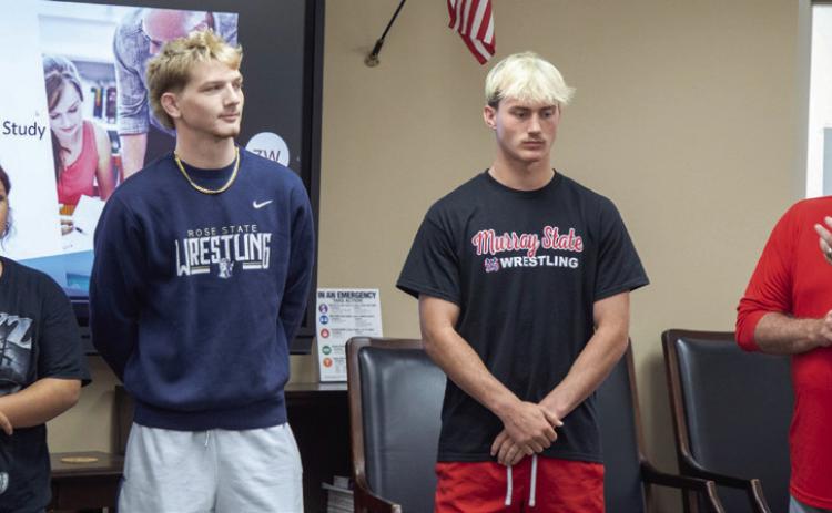 Durant wrestling state qualifiers were recognized during last week’s meeting of the Durant Board of Education. From left, Camilla Amaya, Mac Barbush and Aiden Polk. Also shown is wrestling head coach Jim Taylor.