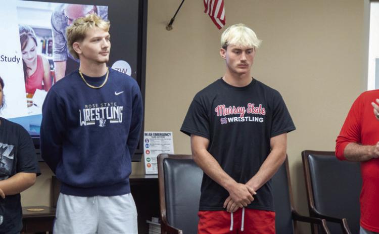 Durant wrestling state qualifiers were recognized during last week’s meeting of the Durant Board of Education. From left, Camilla Amaya, Mac Barbush and Aiden Polk. Also shown is wrestling head coach Jim Taylor.