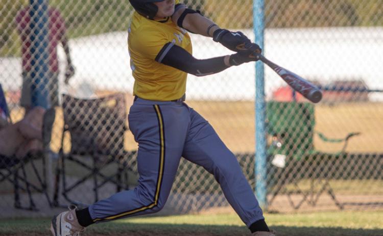 Calera Bulldog Hazyn Applegate swings at the ball. Matt Swearengin | Durant Democrat