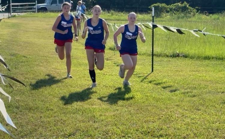 Katelyn Hitchcock, Kyah French and Grace Morrison ran in the Wright City Invitational. Photo provided