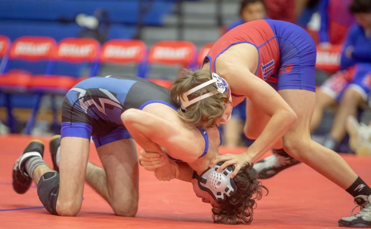 Lion Canan Walls is shown in a recent match. Matt Swearengin | Durant Democrat