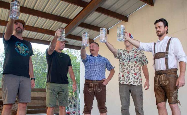 Harbinger Beer Company in Caddo had its inaugural Oktoberfest on Saturday and among activites was a stein holding contest. Matt Swearengin | Durant Democrat