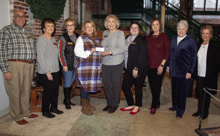 The Durant Fortnightly Club recently made a donation to Three Valley Museum and Donna Tyler presented a check to TVM director Nancy Ferris. They are shown with museum board members and Fortnightly Club members. Matt Swearengin | Durant Democrat